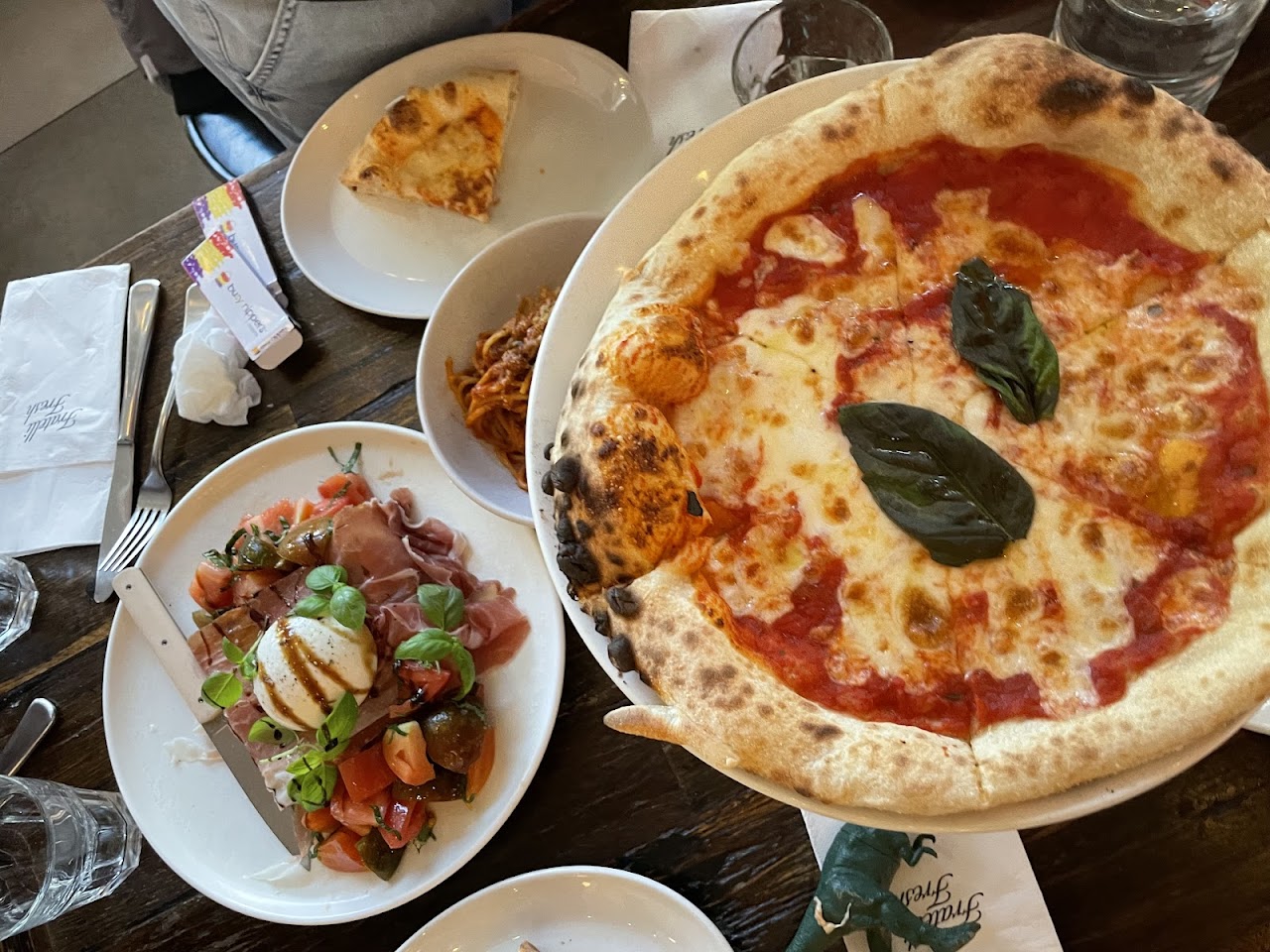 Pizza, gnocchi, and family plates on a Fratelli Fresh table